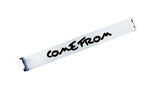 Metallic bar with 'COME FROM' text on a wooden surface